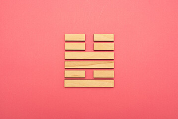 Gene Key 55 wood hexagram i ching on pink background