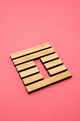 Gene Key 42 wood hexagram i ching on pink background