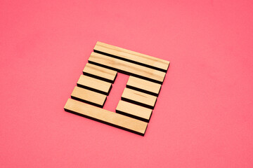 Gene Key 42 wood hexagram i ching on pink background