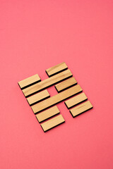 Gene Key 39 wood hexagram i ching on pink background