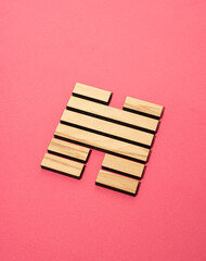 Gene Key 31 Hexagram wood i ching on pink background