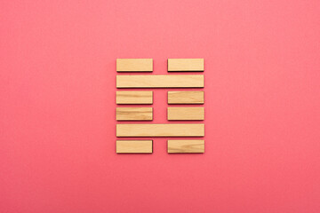 Gene Key 29 Hexagram wood i ching on pink background