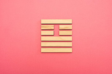 Gene Key 26 Hexagram wood i ching on pink background