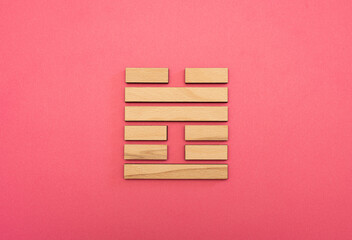 Gene Key 17 Hexagram wood i ching on pink background