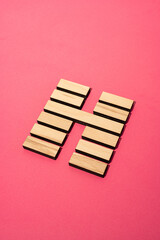 Gene Key 16 Hexagram wood i ching on pink background
