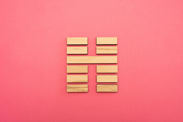 Gene Key 16 Hexagram wood i ching on pink background