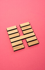 Gene Key 15 Hexagram wood i ching on pink background