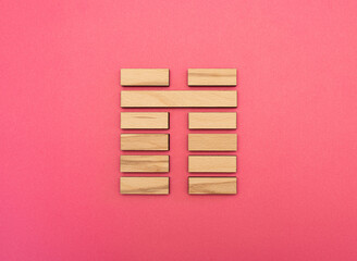 Gene Key 8 Hexagram wood i ching on pink background