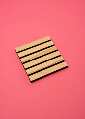 Gene Key 1 hexagram wood i ching on pink background