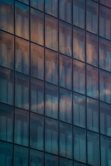 Abstract orange and blue modern glass building