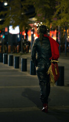 woman walking at night in puerto madero Buenos Aires, Argentina