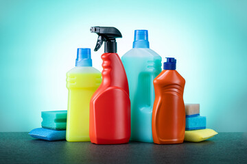 House cleaning products on mint background.