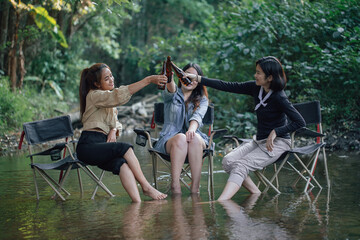 group of Asian girls enjoying a day at the  during holiday camping