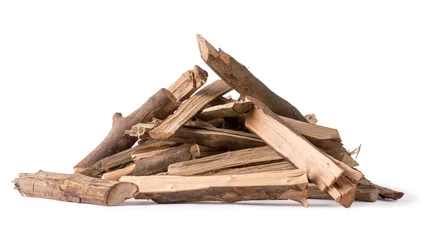 Fotobehang pile of chopped firewood pieces, alternative fuel isolated on white background, closeup © Shamil