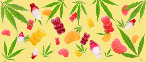 Flying tasty hemp jelly candies on yellow background