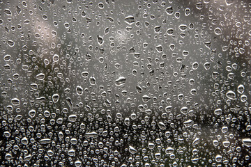 Glass with large water drops.
