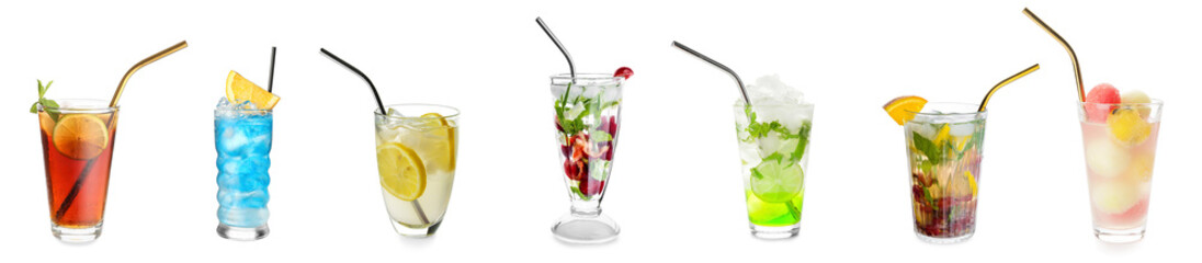 Set of refreshing cold cocktails in glasses on white background
