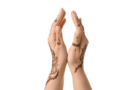 Female hands with beautiful henna tattoo isolated on white background, closeup