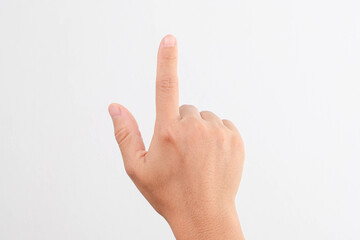 Female hands pointing at something or touching virtual screen on white background, closeup. Hand simulating pressing a button.