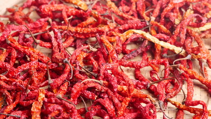 Naklejka premium dried red chili background to dry