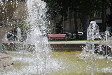 Water stream splashing on ground