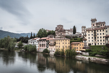 Fototapeta na wymiar View of Bassano del Grappa with the Brenta River from the Alpini Bridge, Vicenza, Veneto, Italy, Europe