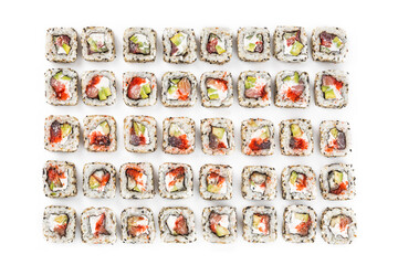 Big sushi set of different rolls. Photo of food on a white background