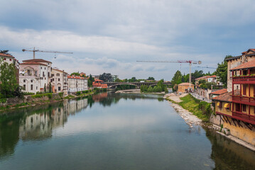 Fototapeta na wymiar View of the Brenta River in Bassano del Grappa from the Alpini Bridge, Vicenza, Veneto, Italy, Europe