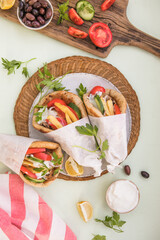 Greek chicken souvlaki ona pita with fresh vegetables with tzatziki sauce