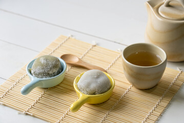 Hot Green Tea Served With Daifuku on Table in Restaurant. Japanese Food Concept