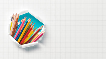 Fototapeta premium Colored pencils in paper hole