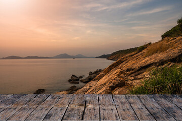 Obraz premium Tabletop Against Sea Scape At Dusk.