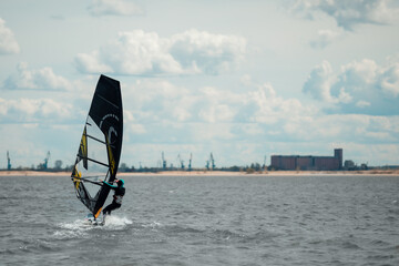 Windsurfer on the Volga River. Surfing in the city. Kazan, Russia