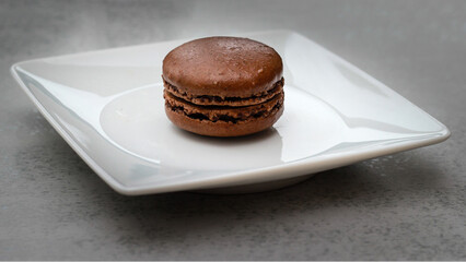 chocolate macaroon on a plate