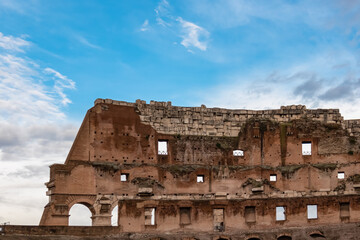 Fototapeta na wymiar Interior view of facade of famous Colosseum of city of Rome, Lazio, Italy, Europe. UNESCO World Heritage Site. Coloseo, Flavian Amphitheater the symbol of ancient Roma city in Roman Empire