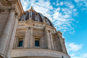 Detailed close up view on Michelangelos Dome of St Peter Basilica in Vatican City, Rome, Lazio, Europe, EU. Architectural masterpiece of Papal Basilica of Saint Peter. Church sightseeing on sunny day