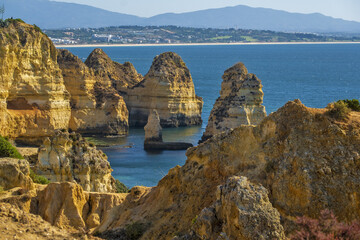 Panoramic view with Cliff, rocks and emerald sea at Ponta da Piedade near Lagos, Algarve, Portugal