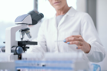 Medical researcher analyzing samples in the lab