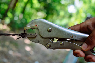 metal locking pliers close up