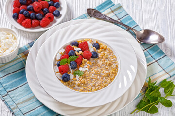 hulled whole grain oat porridge with berries