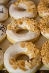 Tasty donuts with jam on wooden background - Hanukkah celebration concept
