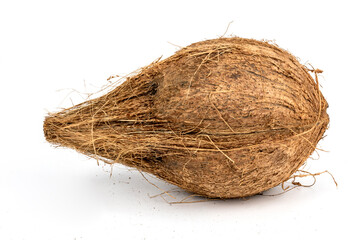 Dried coconut with extreme details of its body texture and hair, isolated in black background and...