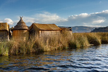 The floating village of Uros on Lake Titicaca, Peru. Lake Titicaca is the largest lake in South America and the highest navigable lake in the world.