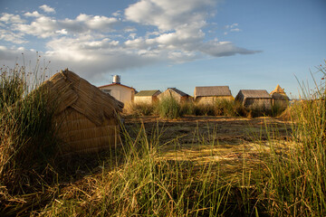The floating village of Uros on Lake Titicaca, Peru. Lake Titicaca is the largest lake in South America and the highest navigable lake in the world.