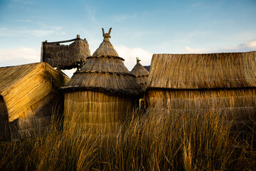 The floating village of Uros on Lake Titicaca, Peru. Lake Titicaca is the largest lake in South America and the highest navigable lake in the world.