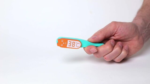 Lowering, getting down kids body temperature from high 39, heat to normal healthy 36 Celsius degrees.