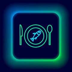 Glowing neon line Served fish on a plate icon isolated on black background. Colorful outline concept. Vector