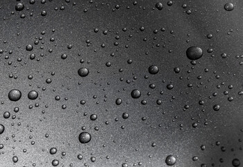  water drops on black background close up