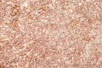 background red gravel road in the countryside
