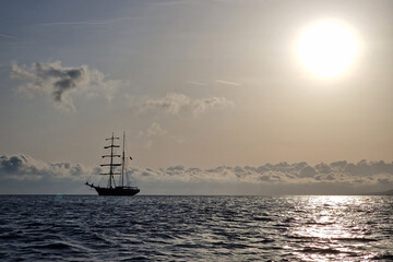 old vessel silhouette at sunset